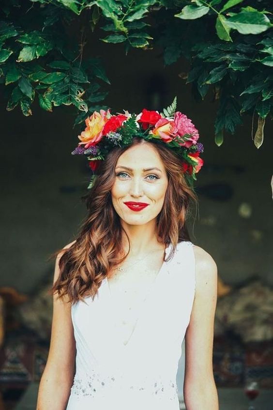 lush and bold summer floral crown with red and orange roses and fern