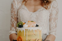 09 Drip wedding cakes is another hot trend represented in this shoot
