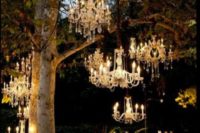 09 crystal chandeliers over the ceremony space are a great glam idea