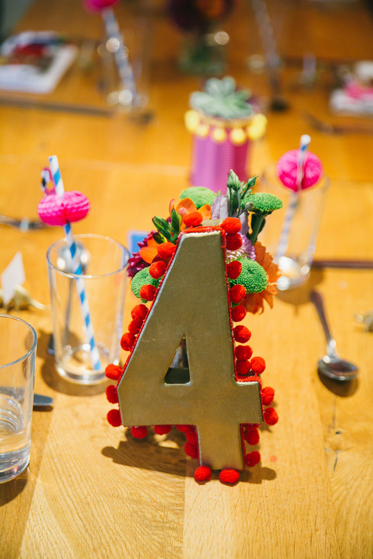 Look at these pompom trim table numbers, aren't they gorgeous