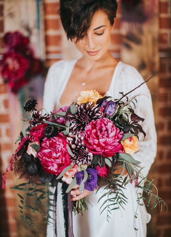 deep purple, fuchsia and black wedding bouquet for a moody bride
