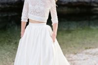 12 two piece wedding dress with a lace bodice with sleeves and a plain skirt with pockets
