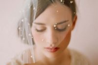 13 tiny subtle birdcage veil with some pearls