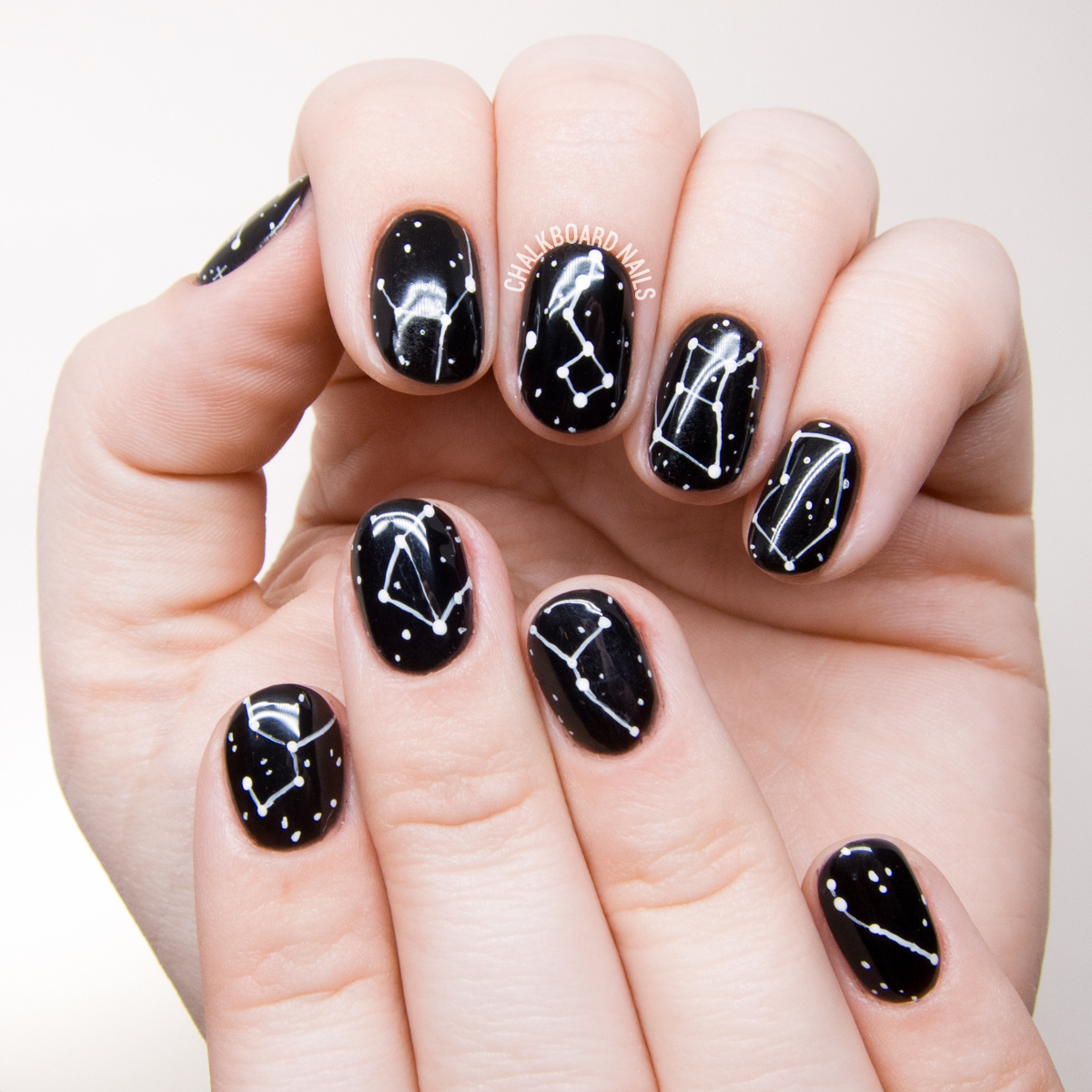 black and white constellation nail art