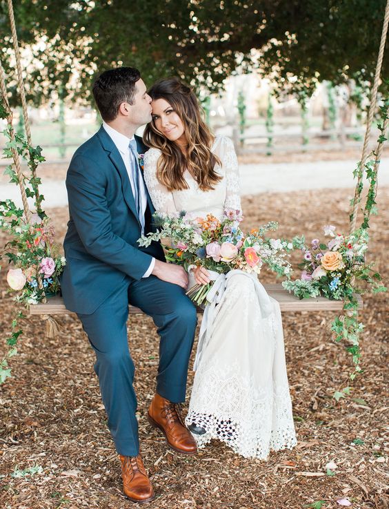 boho rustic swing covered in pastel florals