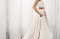 14 modern bridal separate with a plain strap top and a high low skirt with pockets