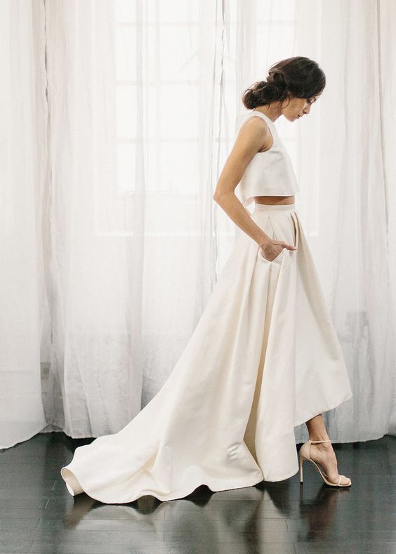 modern bridal separate with a plain strap top and a high low skirt with pockets