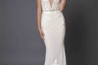 14 plunging neckline wedding dress with lace appliques and an embellished belt for an accent