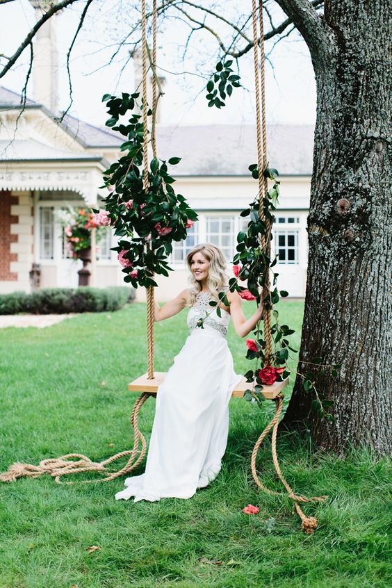 eye-catchy swing with bold red roses and leaves