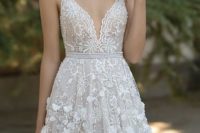 16 A line  wedding dress with spagetti straps,a sweetheart neckline and floral appliques