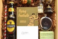 17 a box with Guinness, a book, a perfume, a soap piece and a goblet