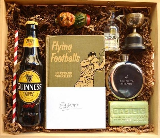 a box with Guinness, a book, a perfume, a soap piece and a goblet