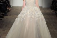17 champagne strapless sweetheart neckline ballgown with white floral appliques on the skirt