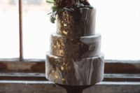 18 three-tier agate print wedding cake with gold detailing, fresh blooms and a chocolate topper