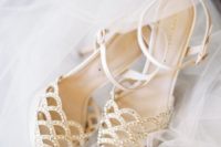18 white peep toe and laser cut wedding heels with a fish scale pattern and rhinestones