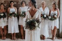 20 mismatching white bridesmaids’ dresses in the same style