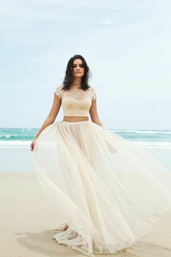 ivory flowy tulle skirt and a lace cap sleeve crop top with pearls