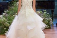 21 strapless ballgown with a lace bodice and a layered tulle skirt