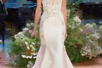 22 lace mermaid wedding dress with a plunging neckline and thick straps