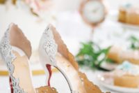 22 white laser cut heels with laser cut floral decor