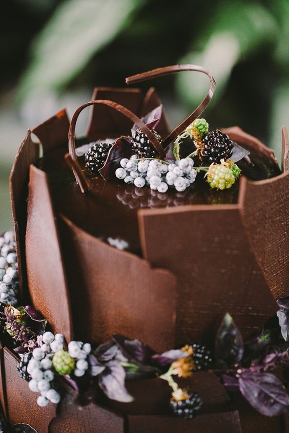 all-chocolate wedding cake with fresh berries and stunning design