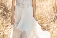 25 boho beaded wedding dress with an embellished bodice and thread cap sleeves