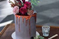 25 concrete-inspired matte cake with blackberries, bold blooms and molten copper drip