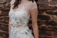 25 illusion neckline wedding dress with spaghetti straps and pastel floral lace appliques