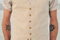 28 a short sleeve shirt and a vest with pants, all of natural fabrics for comfort