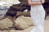 29 a boho wedding dress with a mermaid silhouette and heavy beading