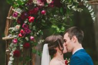 29 hot red and pink and burgundy flower wedding arch with eucalyptus