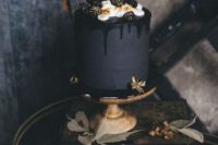 29 matte black wedding cake with black dripping, cream, blackberries and dark chocolate