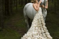 30 strapless ivory wedding dress wiht a train and lots of soft floral appliques