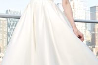 31 high low wedding dress with a lace bodice and cap sleeves and a plain skirt