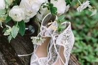31 laser cut white bridal booties with lacing