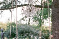 33 a swing turned into a hanging bar for an outdoor wedding