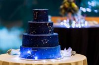 33 navy and blue cake with different star constellations