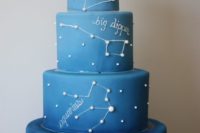 35 ombre blue constellation wedding cake with white decor