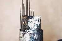 36 unique constellation wedding cake in navy and black with thin black candles