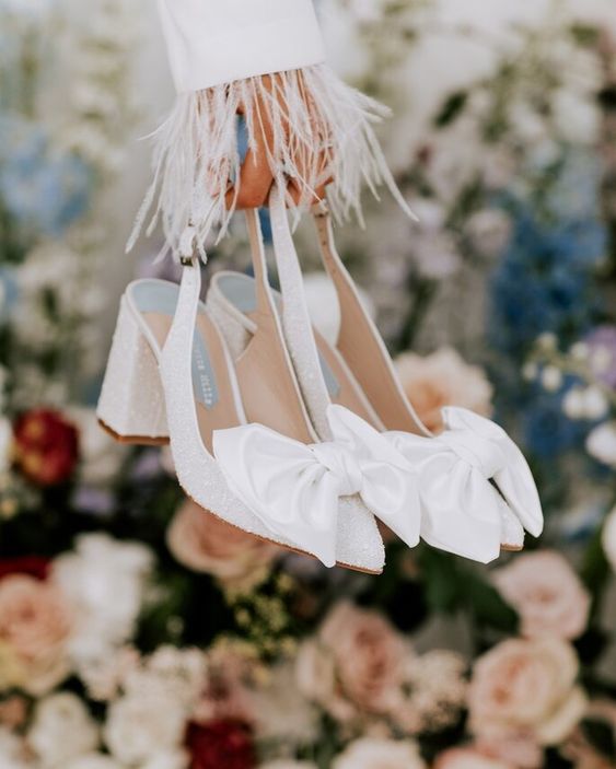 beautiful white pearl bow wedding slingbacks are a very shiny, chic and trendy solution for a wedding