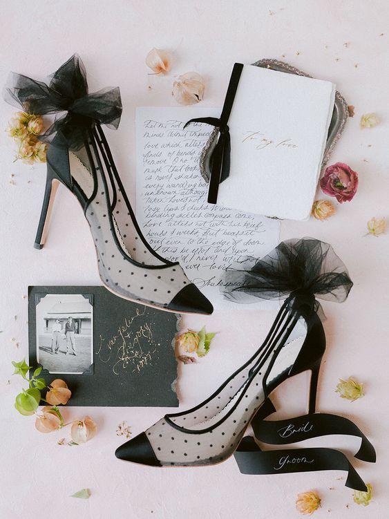 black wedding shoes with sheer polka dot parts, tulle bows on the backs are a quirky and girlish idea