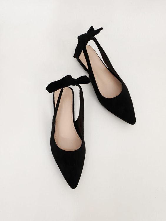 classy black velvet slingbacks with bows on the backs are amazing for any wedding, they are comfy and can be worn afterwards