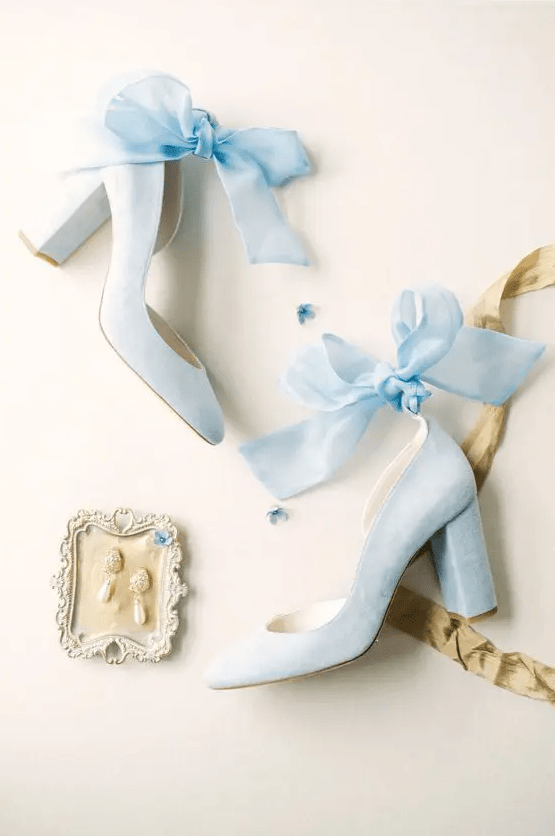 pastel blue wedding shoes with comfy block heels and large bows that are so trendy right now