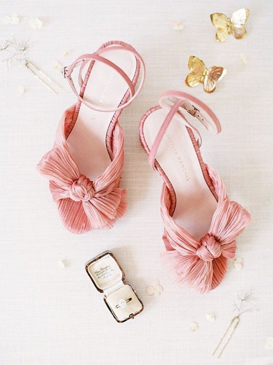 pink heeled slingbacks with bows are amazing for any spring or summer bridal look, they look chic and catchy
