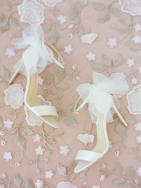 white wedding shoes with ankle straps and tulle bows are amazing for spring and summer, they are delicate, chic and lovely