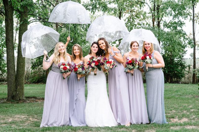 The bridesmaids were wearing mismatching lavender and blue maxi dresses