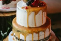 02 semi naked cake with caramel drip, topped with a pear, blackberries and a pomegranate