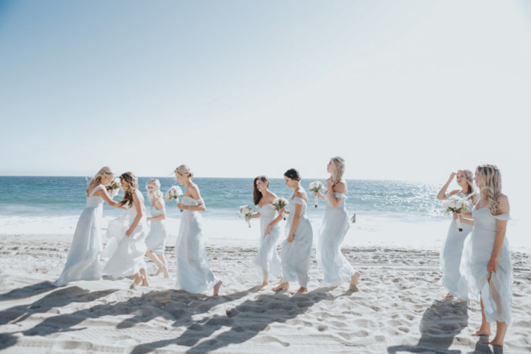 The bridesmaids were wearing icy blue off the shoulder dresses, flowy and comfy