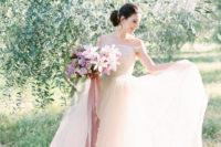 03 The ethereal off the shoulder blush wedding dress was by BHLDN