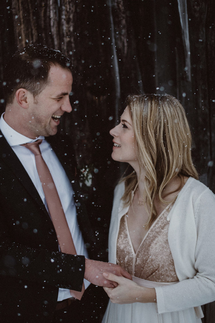 A short white cashmere cardigan kept the bride warm during the shoot outside